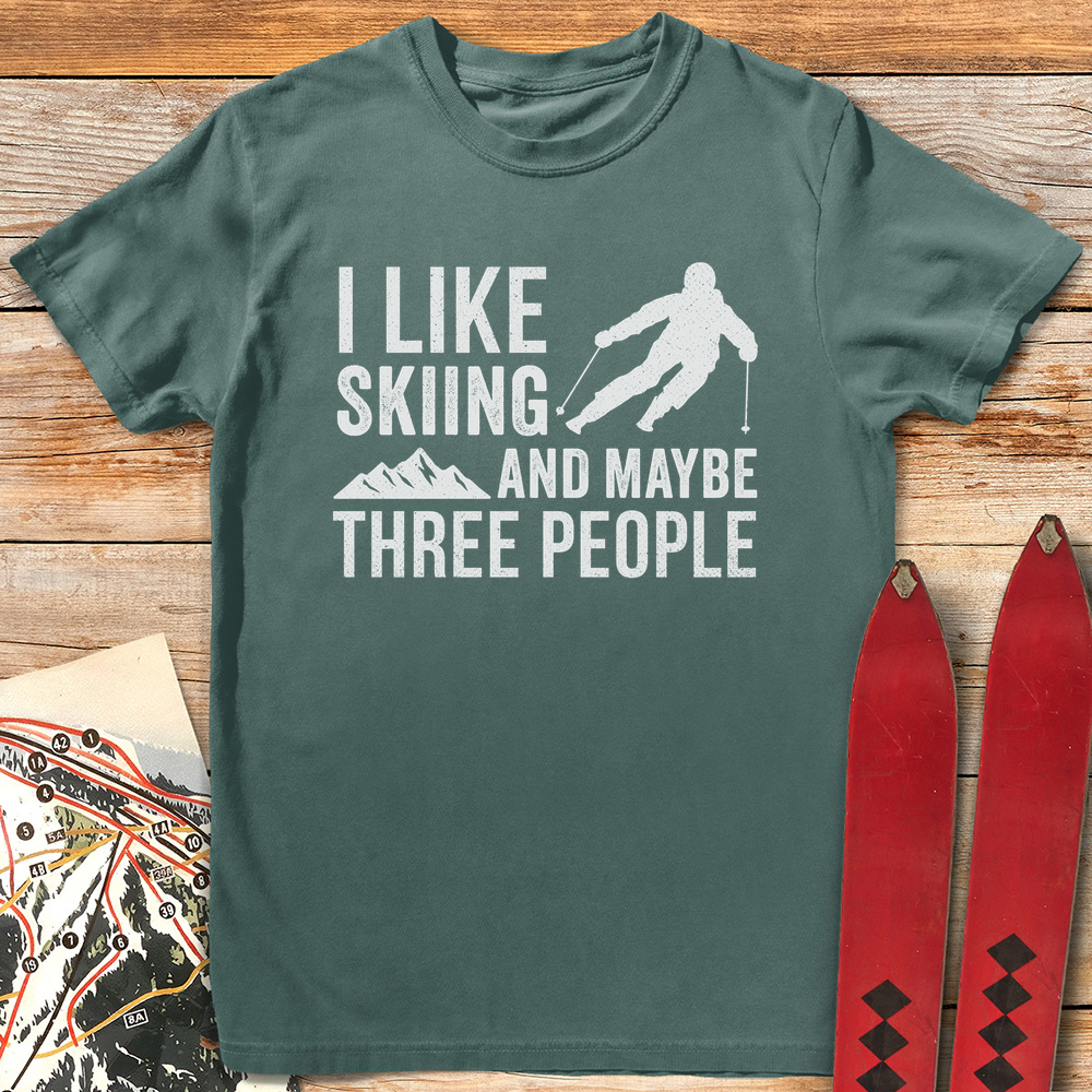 Three People Skiing
