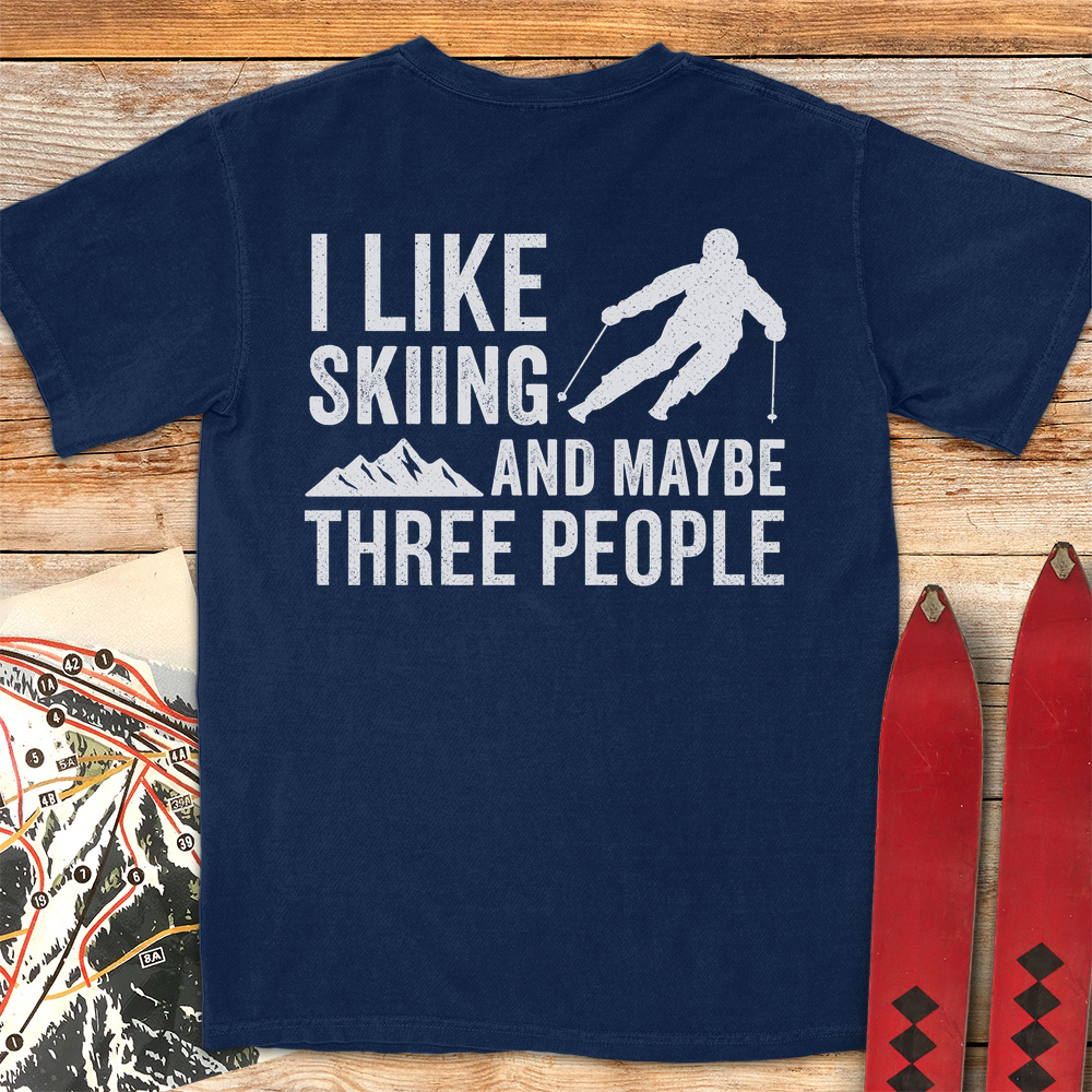 Three People Skiing
