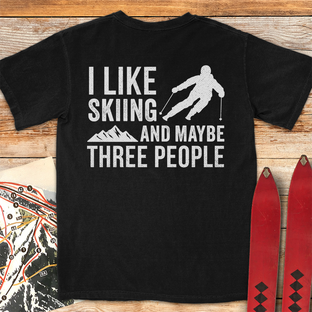 Three People Skiing