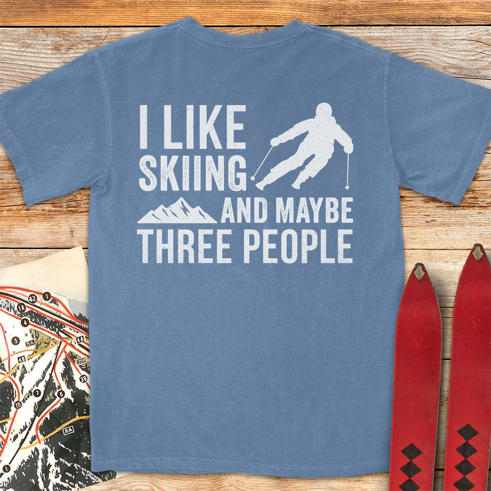 Three People Skiing