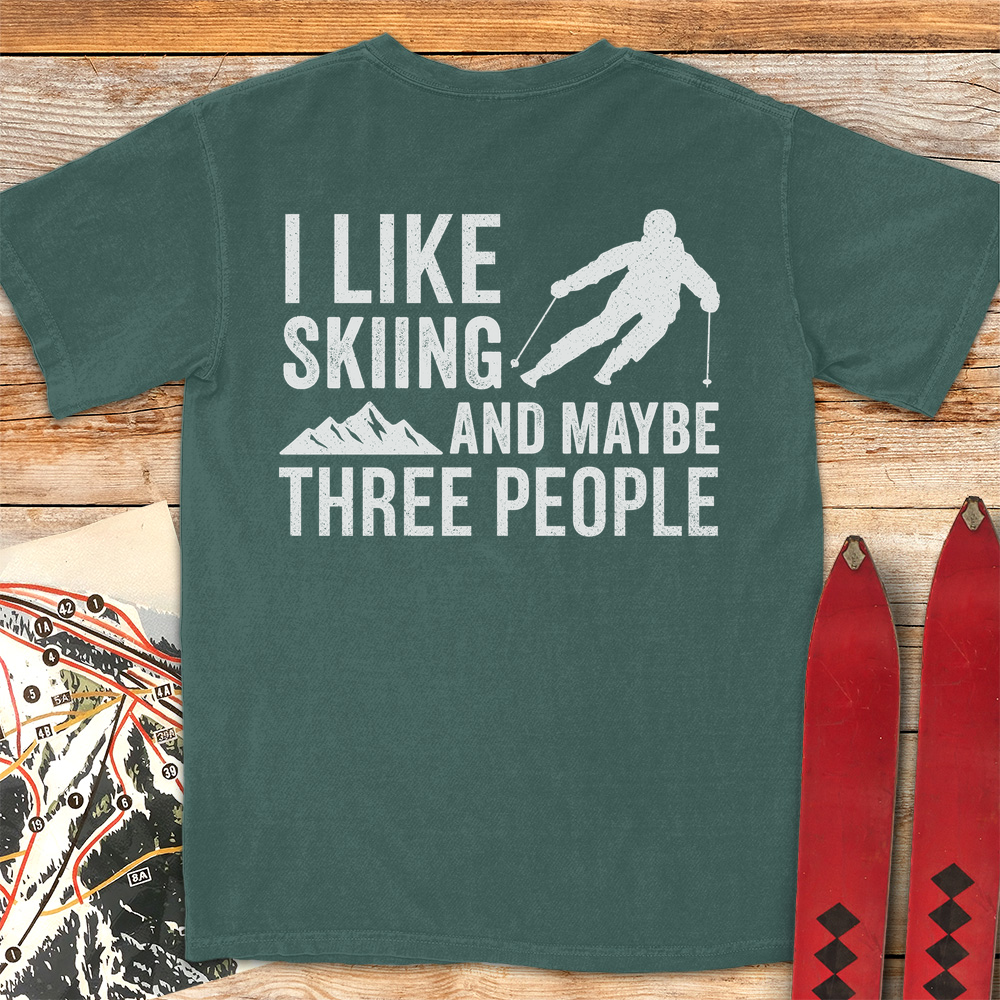 Three People Skiing