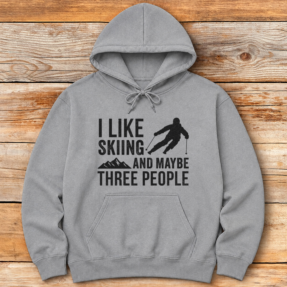 Three People Skiing